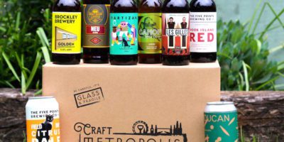 A display of bottles and cans of craft beer produced by Craft Metropolis